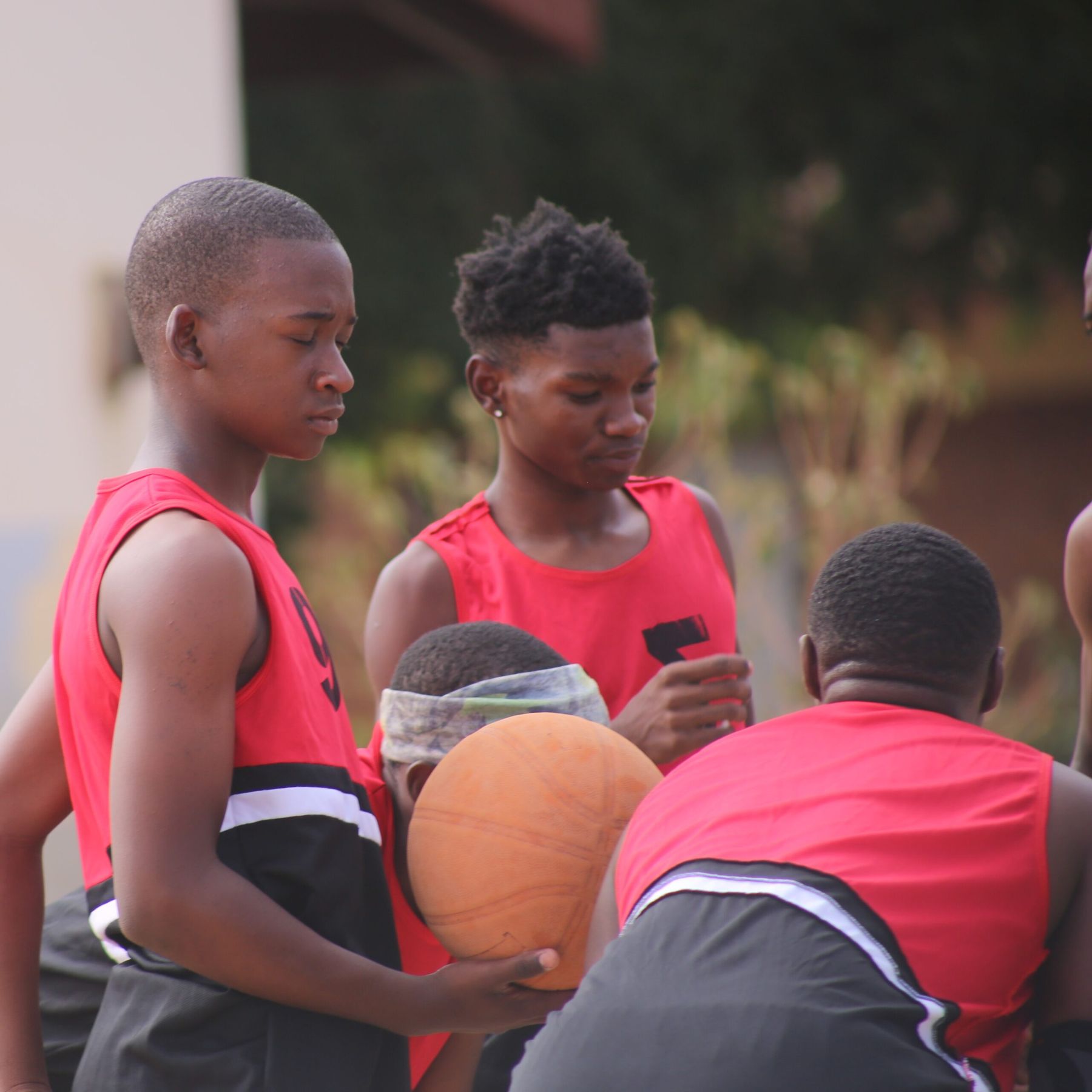 Junior players in a team huddle